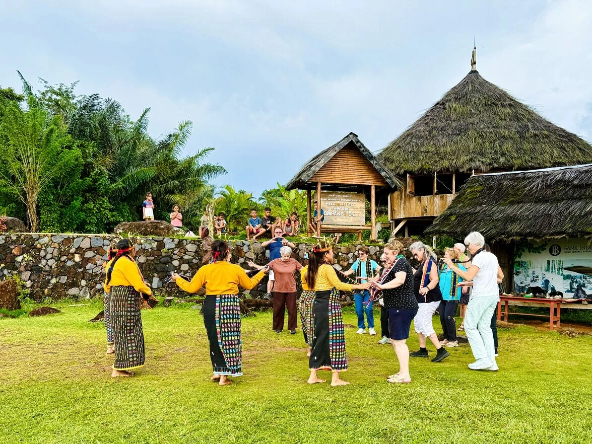 A group of Italians in Melo Village join cultural dance of Manggarai Flores